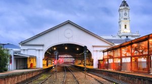 Places to visit in Ballarat Historic train station on victorial railways with clock tower and multiple tracks to platforms